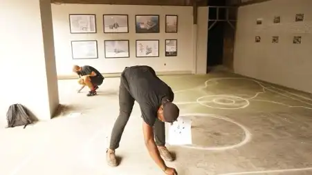 Dane Komljen, The Seven Elements, setup with artist in the back and co-worker, Lagos Biennial 2019